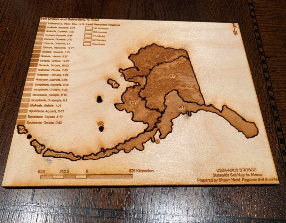 Laser cut puzzle of Alaska's soil profile 